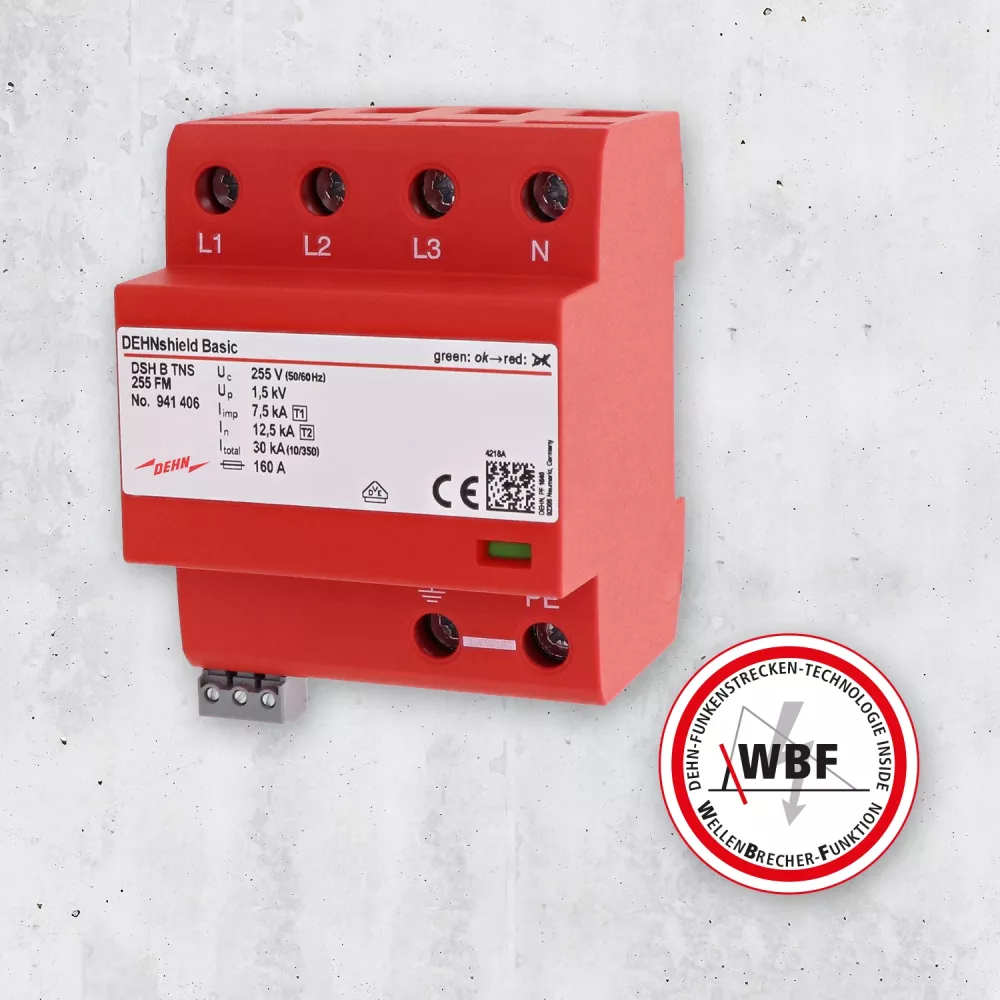 Red DEHNshield Basic surge protection device labeled L1, L2, L3, N mounted on wall, WBF logo visible.